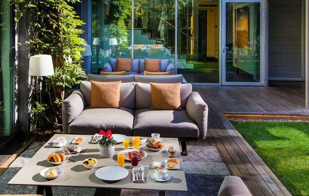 Tranquil terrace dining at ABaC Restaurant & Hotel in Barcelona