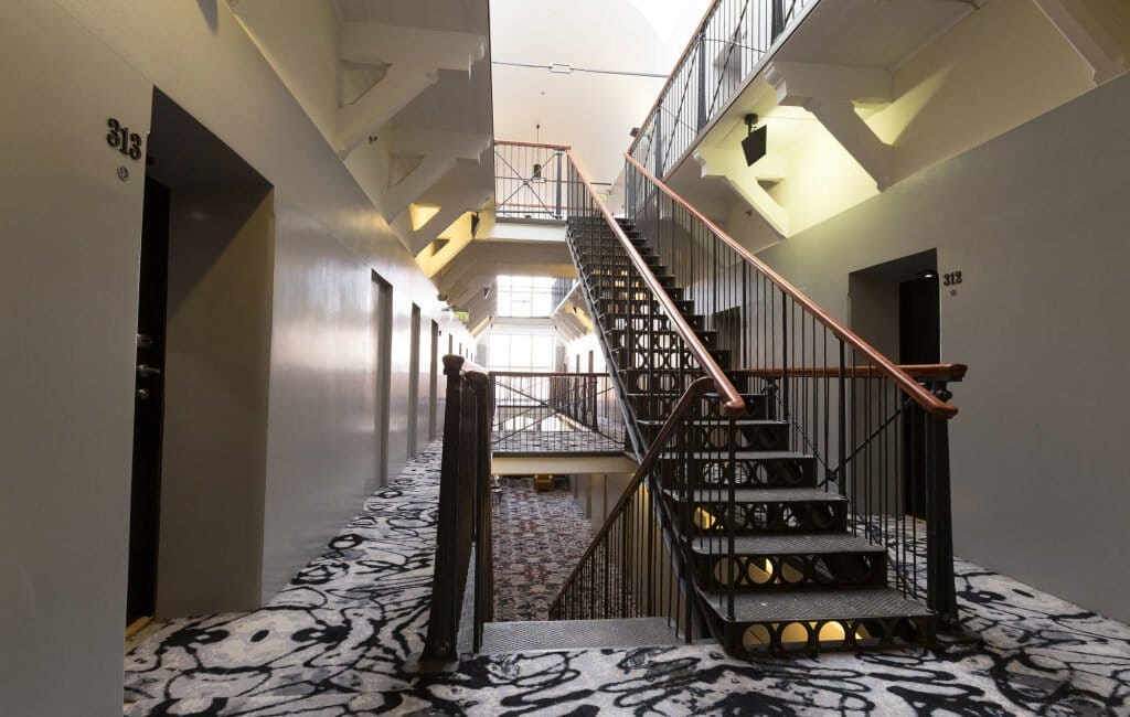 Staircase inside Hotel Katajanokka, a former prison turned luxury hotel in Helsinki