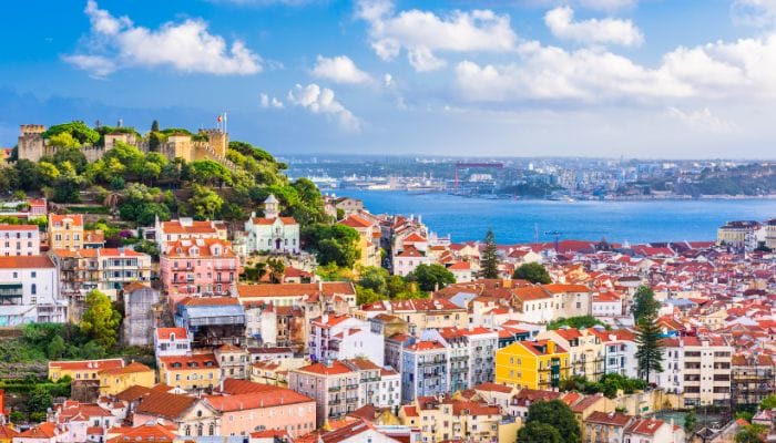 Lisbon, Portugal, is famous for its breathtaking views, featuring historic buildings and the Tagus River.