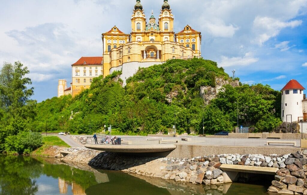 View of Melk Abbey's exterior with the river below