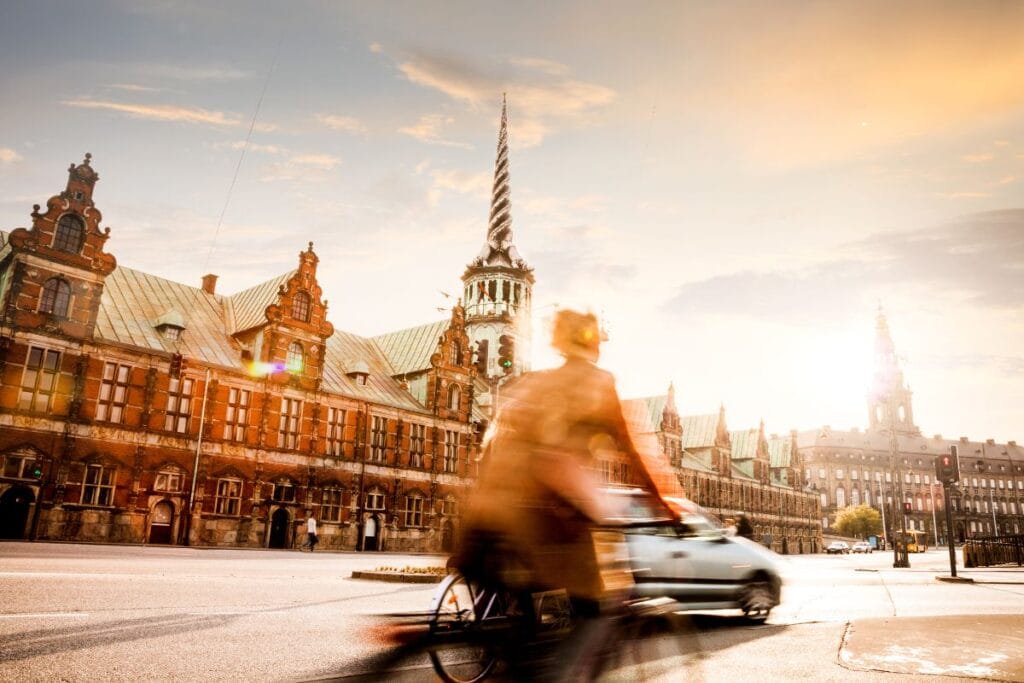 Cyclist riding through the streets of Copenhagen.