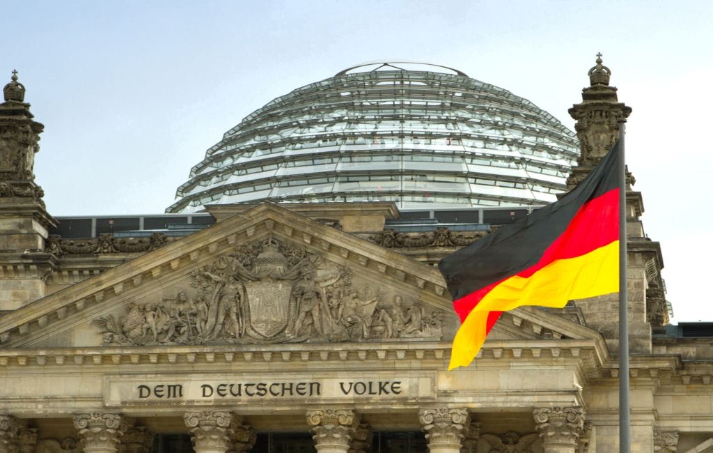 Reichstag dome with the German flag, symbolizing German culture